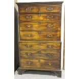 A George III mahogany chest-on-chest, the moulded pediment above an arrangement of drawers with