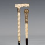 A late 19th century ebonized walking cane with a foliate chased gold plated handle above a carved