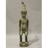 A large carved hardwood tribal ancestor figure, probably Sumatran, Indonesia, height 147cm.Buyer’s