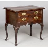 A George III mahogany lowboy, fitted with two pine-lined drawers above a fretwork apron, height