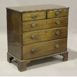 A George III mahogany chest of two short and three long drawers, height 95cm, width 94cm, depth