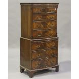 A late 20th century reproduction mahogany serpentine front tallboy, fitted with two short and six