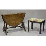 A Victorian mahogany oval Sutherland table, on turned and carved supports, height 71cm, width 106cm,