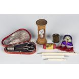 A small group of needlework items, including a 'McFarlane' Tartanware tape measure, length 2.6cm (