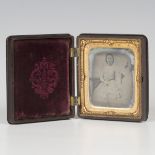 A 19th century daguerreotype portrait of a lady, within a gutta-percha case, 10cm x 8.5cm, a 19th