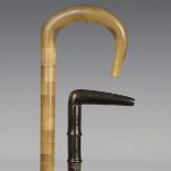 A late 19th century turned sectional horn walking cane, possibly rhino horn, length 85cm, together