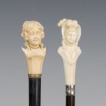 A late 19th century ebonized walking cane, the ivory handle carved as the head and shoulders