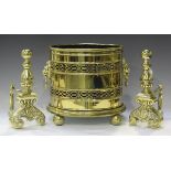 An Edwardian brass oval log bin of pierced form, height 36cm, width 42cm, together with a pair of