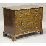 A George III mahogany chest of two short and three long drawers, on bracket feet, height 86cm, width