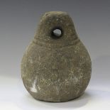 A 19th century stone fishing sinker weight, probably Chinese, height 26cm.Buyer’s Premium 29.4% (