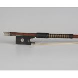 A silver mounted violin bow, length 74.5cm, weight 57.3g.Buyer’s Premium 29.4% (including VAT @ 20%)