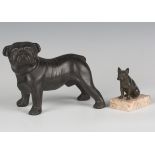 An early 20th century patinated cast spelter model of a seated French bulldog, raised on a marble