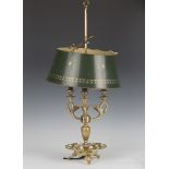 A 20th century Regency style cast brass three-light table lamp, fitted with an adjustable green tole