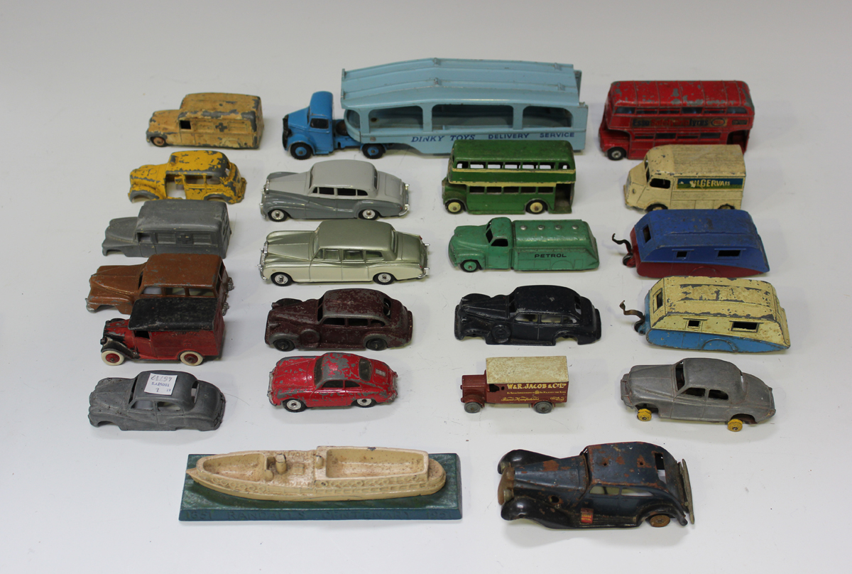 A small collection of Dinky Toys and Supertoys vehicles, including a No. 982 car transporter, two