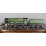 A Bassett-Lowke gauge 1 live steam 4-4-0 locomotive and six-wheel tender project, refinished in