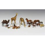 Seventeen Elastolin plastic zoo and farm animals, including two giraffes, a tiger, rabbits and a
