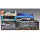 A collection of modern die-cast vehicles, including Atlas, Corgi, Eddie Stobart and landspeed