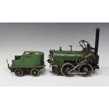 A 3½-inch gauge coal fired live steam 0-4-0 locomotive and tender, finished in green and black