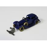 A pre-war Dinky Toys No. 24c town sedan car, finished in blue with black wheels and white tyres (