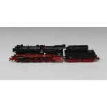 A Märklin gauge HO No. 37040 2-10-0 locomotive and tender, finished in DB black and red livery,