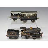 A Hornby Series gauge O clockwork M3 0-4-0 locomotive and tender 2710, finished in LMS black livery,