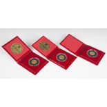 A group of three gold proof Balliwick of Jersey one pound coins, 1983, 1984 and 1985, cased.Buyer’