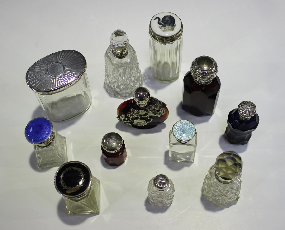 An Edwardian silver mounted ruby glass scent bottle and stopper, the faceted body beneath a - Image 2 of 2