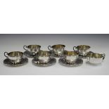 A set of six Spanish silver cups and saucers by Vachier, each with acanthus and reeded rims, total
