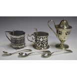 An Edwardian silver mustard of pierced urn shaped form with hinged lid and loop handle, on a