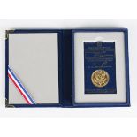 A USA 1984 Olympic gold brilliant uncirculated commemorative ten dollar coin, cased.Buyer’s