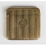 A 9ct gold rectangular vesta case with engine turned decoration, crest engraved, Birmingham 1916,