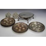 A collection of assorted plated items, including a swing handle basket, a circular tray and a set of