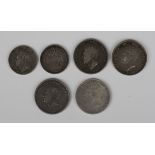 Four George IV shillings, 1824, 1825, 1826 and 1827, and two George III sixpences, 1821 and 1829.