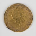 A Victoria Old Head half-sovereign 1901 (previously mounted).Buyer’s Premium 29.4% (including