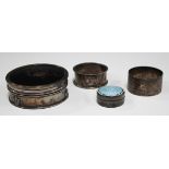 A George V silver circular ring box, the tortoiseshell hinged lid piqué inlaid with an urn and