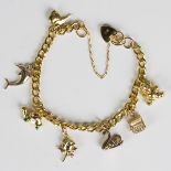 A 9ct gold hollow curblink charm bracelet, fitted with seven charms, including a swan and a teddy