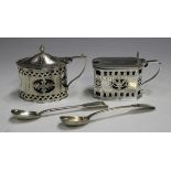 A Victorian silver mustard of canted corner rectangular form with hinge lid, pierced and engraved