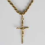 A gold ropetwist link neckchain, weight 20.6g, length 71cm, fitted with a gold pendant crucifix,