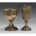A 20th century Judaic silver kiddush cup, the tapered bucket bowl with embossed decoration, on a