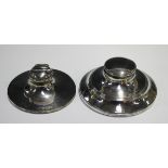 An Edwardian silver capstan inkwell, the hinged lid with pen recess, Birmingham 1905 by Cornelius