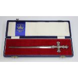 An Elizabeth II silver coronation paperknife, the cross handle with crown finial, Sheffield 1952