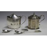 A George III silver oval mustard with hinge lid and blue glass liner, the sides with engraved