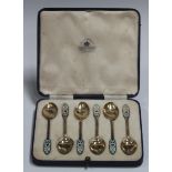 A set of six Art Deco silver gilt and enamel coffee spoons, Birmingham 1938 by Mappin & Webb, cased,