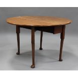 A late George III pale oak oval drop-flap breakfast table, height 71cm, length 127cm, depth 108cm,