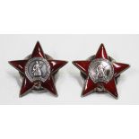 Two Russian red enamelled Orders of the Red Star, one back numbered '3571114', the other back