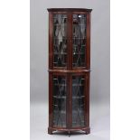 An Edwardian mahogany bowfront floor-standing display cabinet with boxwood stringing, height