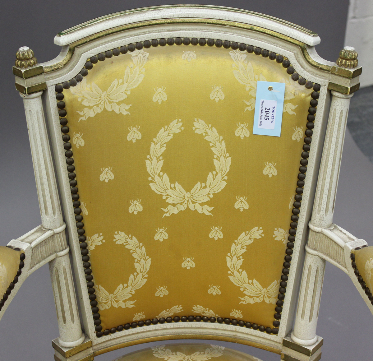 A pair of 20th century Louis XVI style white painted and gilt fauteuil armchairs, upholstered in - Image 7 of 12