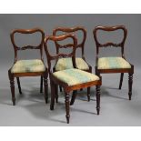 A set of four William IV mahogany spoon back dining chairs, on tulip cusp legs, height 86cm, width