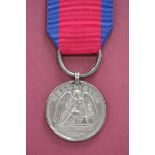 A Waterloo Medal 1815 to 'Robert Moore, Royal Artill.Drivers', fitted with steel clip and suspension