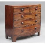 A George IV mahogany bowfront chest of oak-lined drawers with satinwood crossbanded borders,